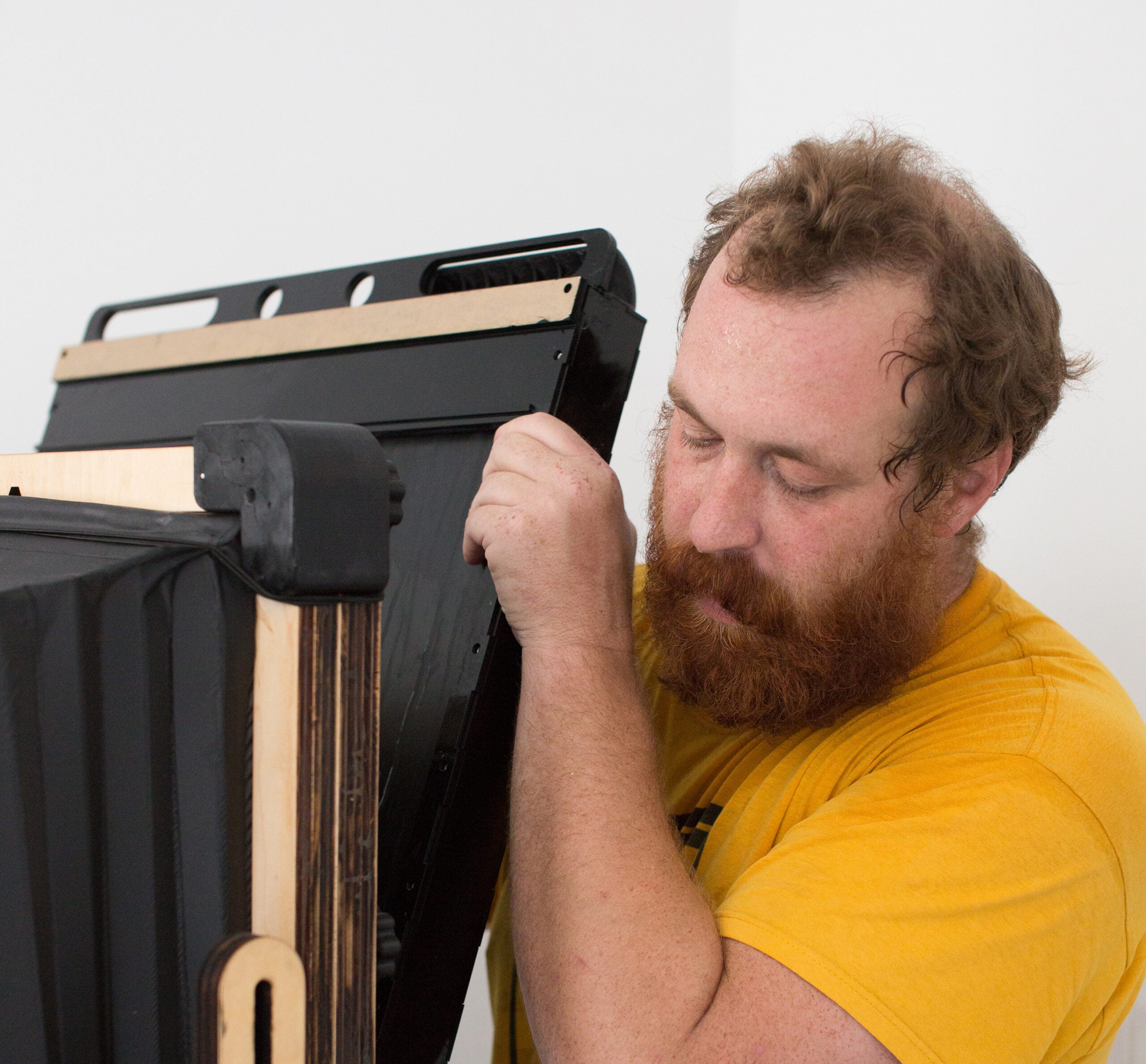 Ethan removing the film holder from his custom 20x24 camera.