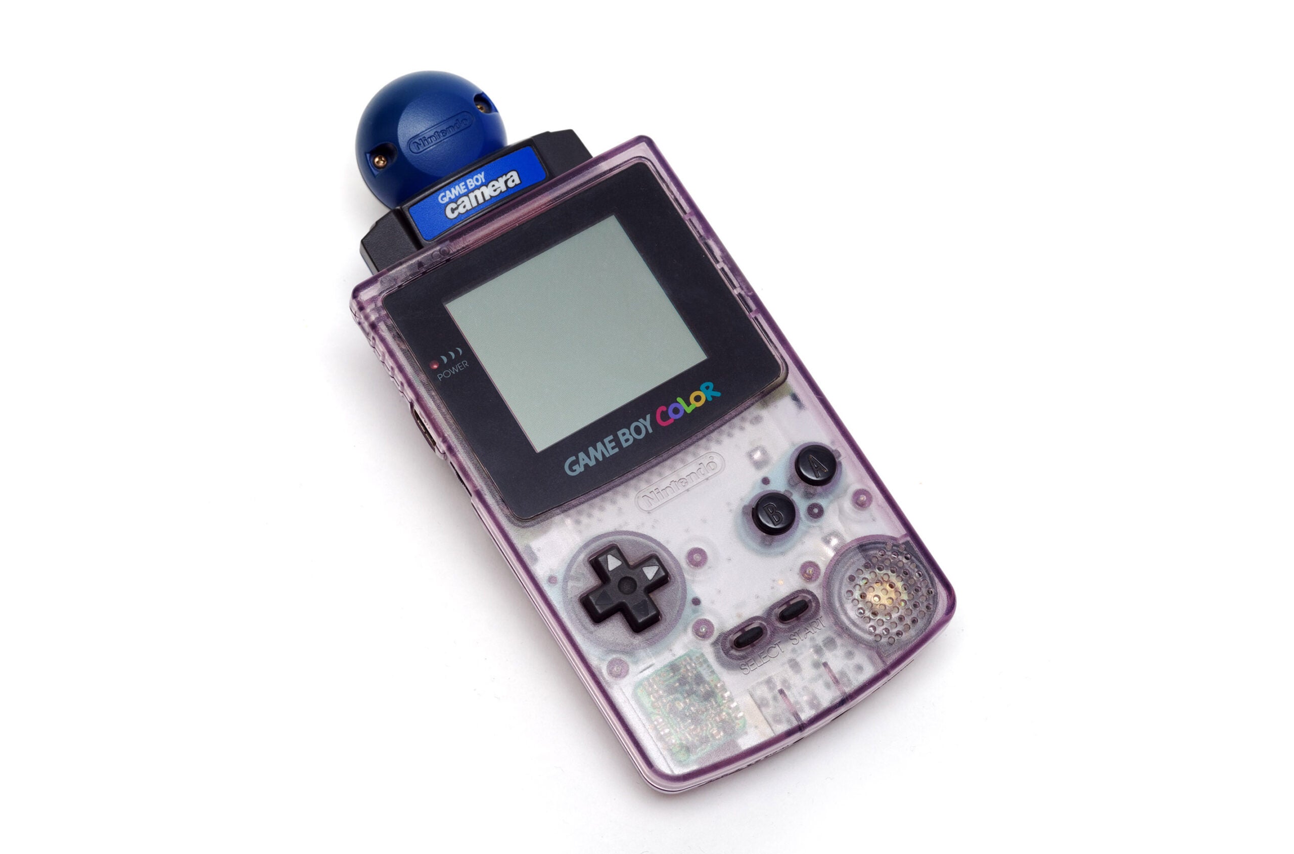 A Gameboy Camera emparelhada com uma Gameboy Color translúcida.