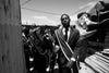 Siyabulela, 16, leads his churchÃs brass band through the KTC neighborhood of Nyanga in Cape Town, South Africa.