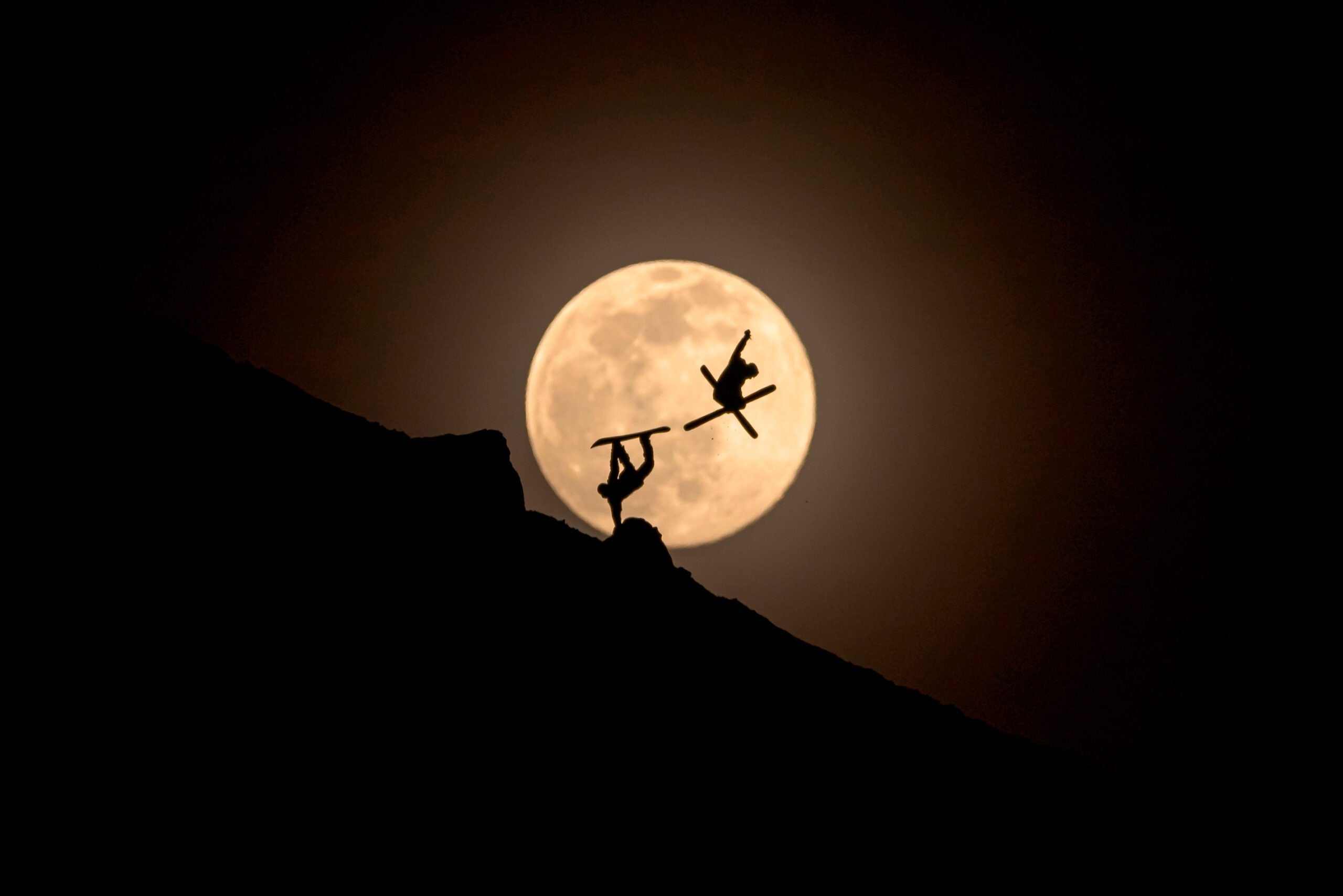 Yhabril (Spain) won the Best of Instagram category (photography) for his photo of a skier and snowboarder silhouetted against the moon.