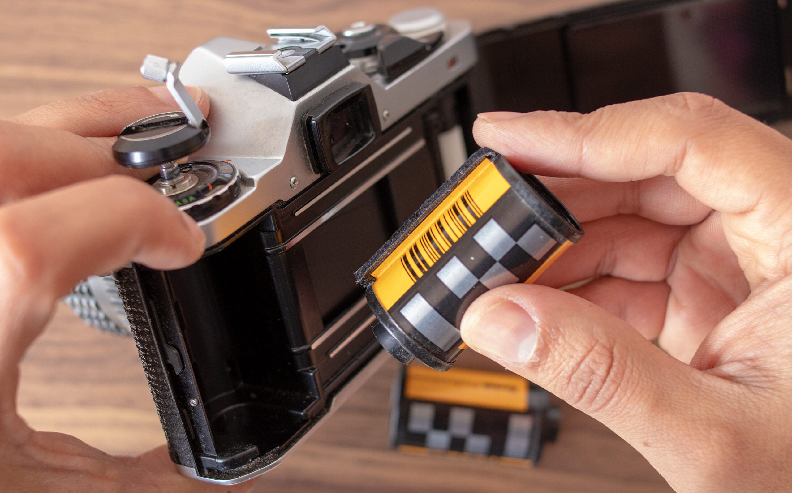 Loading a film camera.