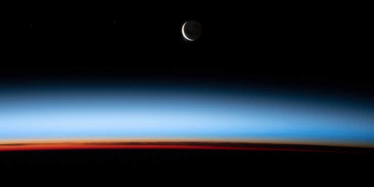 This stunning crescent moon was captured by astronauts aboard the ISS with a Nikon D5
