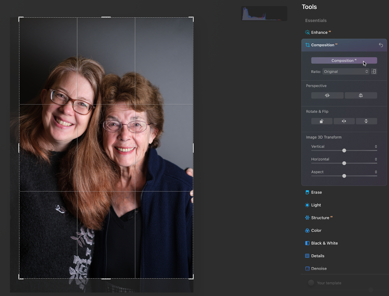 Luminar AI looks as if it emphasized each face along the rule-of-thirds guides, but kept the distracting fingers at right.