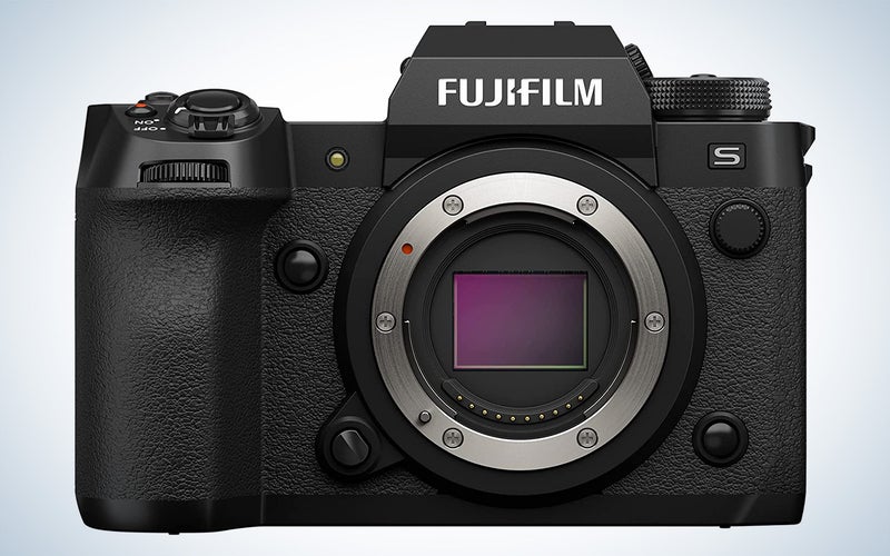 Fujifilm X-H2S camera body with no lens on a plain background