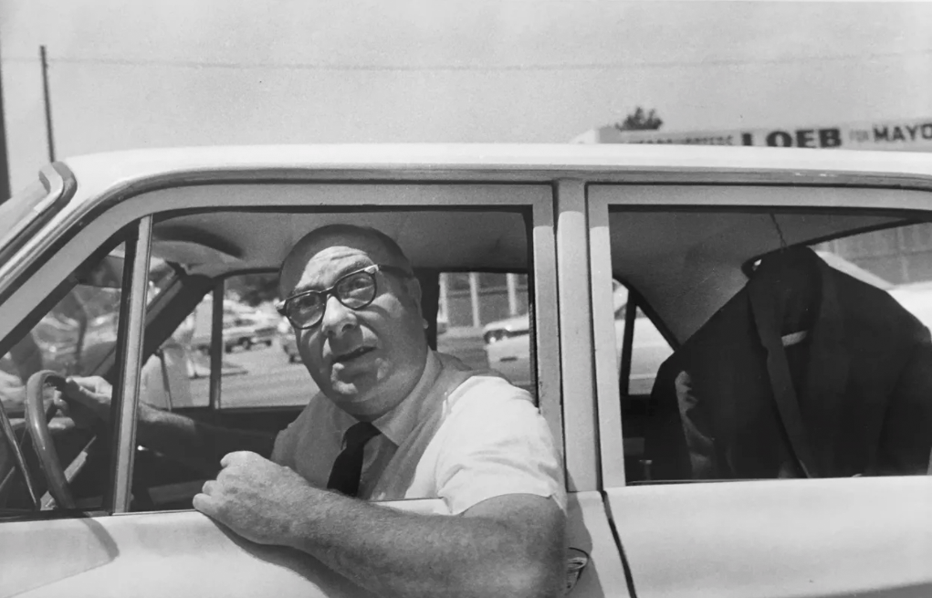 “Untitled (Man in Car),” William Eggleston, 1968, Silver gelatin print. Vintage, Image: 6 3/16 x 9 1/2 inches.