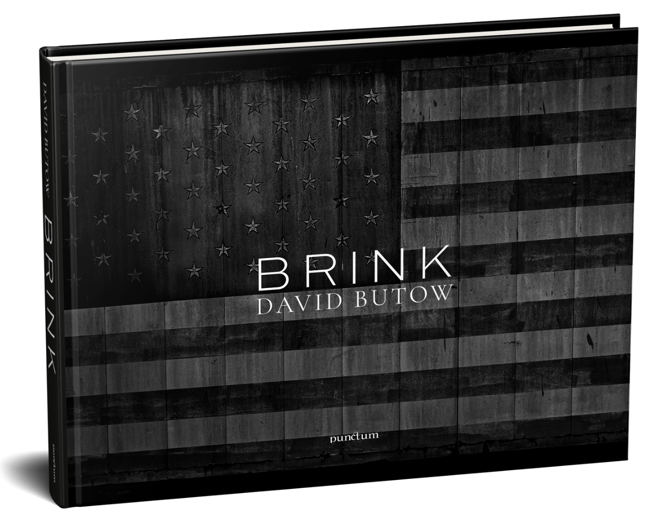 BRINK, by David Butow, is published by Punctum Books. The cover shot is a black-and-white treatment of a flag painted on the side of a barn.