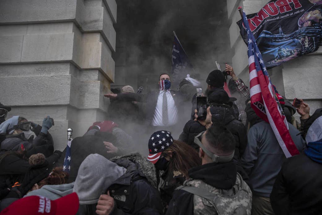 âProtesters attempt to breach the US Capitol during a day of protests against the certification of President Joe Biden's win in Washington, DC, on Jan. 6, 2021,â by Victor J. Blue.
