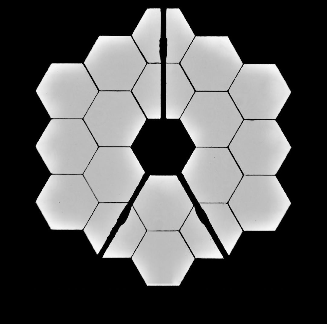 A 'selfie' snapped by the James Webb Space Telescope showing its 18 mirrors.