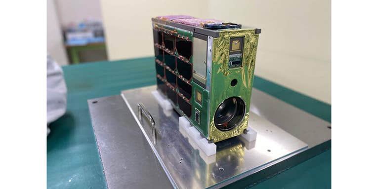 A modified Pentax 300mm f/4 heads into space aboard a nanosatellite