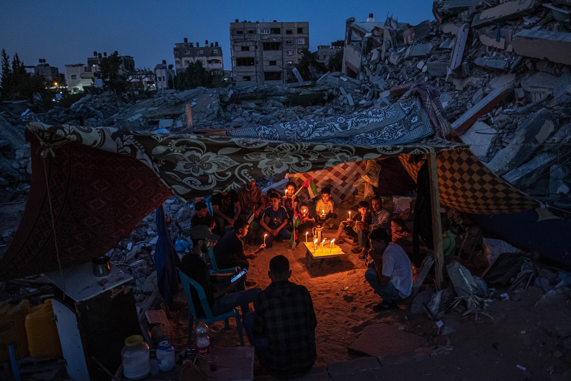 Palestinian photographer Fatima Shbair won the Singles category for this photo of Palestinian children gathering with candles in Gaza.