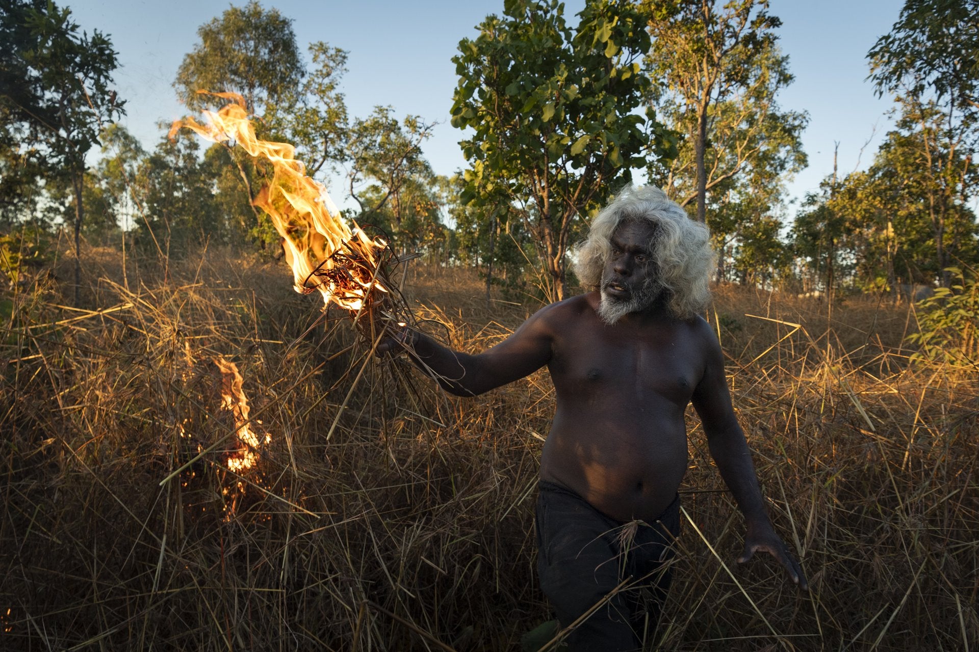 Australian photographer Matthew Abbott won the Stories category for Saving Forests with Fire, his series documenting how Indigenous Australians have strategically set fires to protect the environment and stop fuel building up that would lead to larger, more devastating fires.