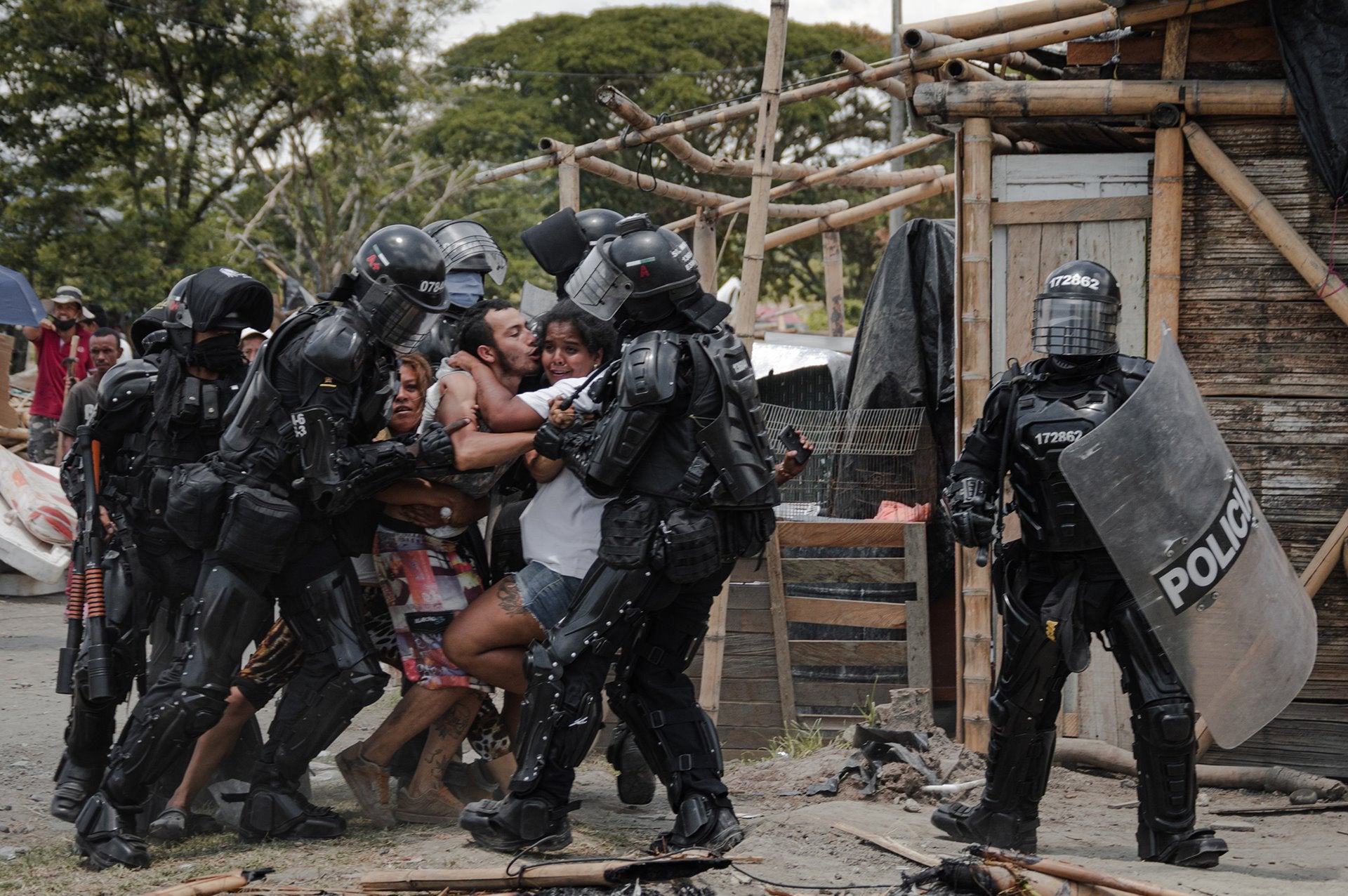 Colombian photographer Vladimir Encina won the Singles category for his photo showing police arresting a man during evictions to clear the way for a ârailroad megaprojectâ in Puerto Caldas, Colombia.