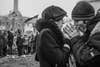 Warming one anotherâs hands in the bitter cold, a couple going fellow Ukrainian demonstrators on the main square in Kyiv, where thousands gathered to protest presidential election fraud.