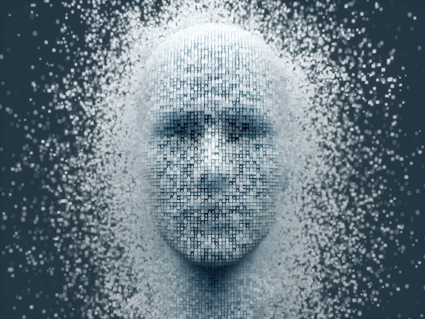 3D dissolving human head made with cube shaped particles.