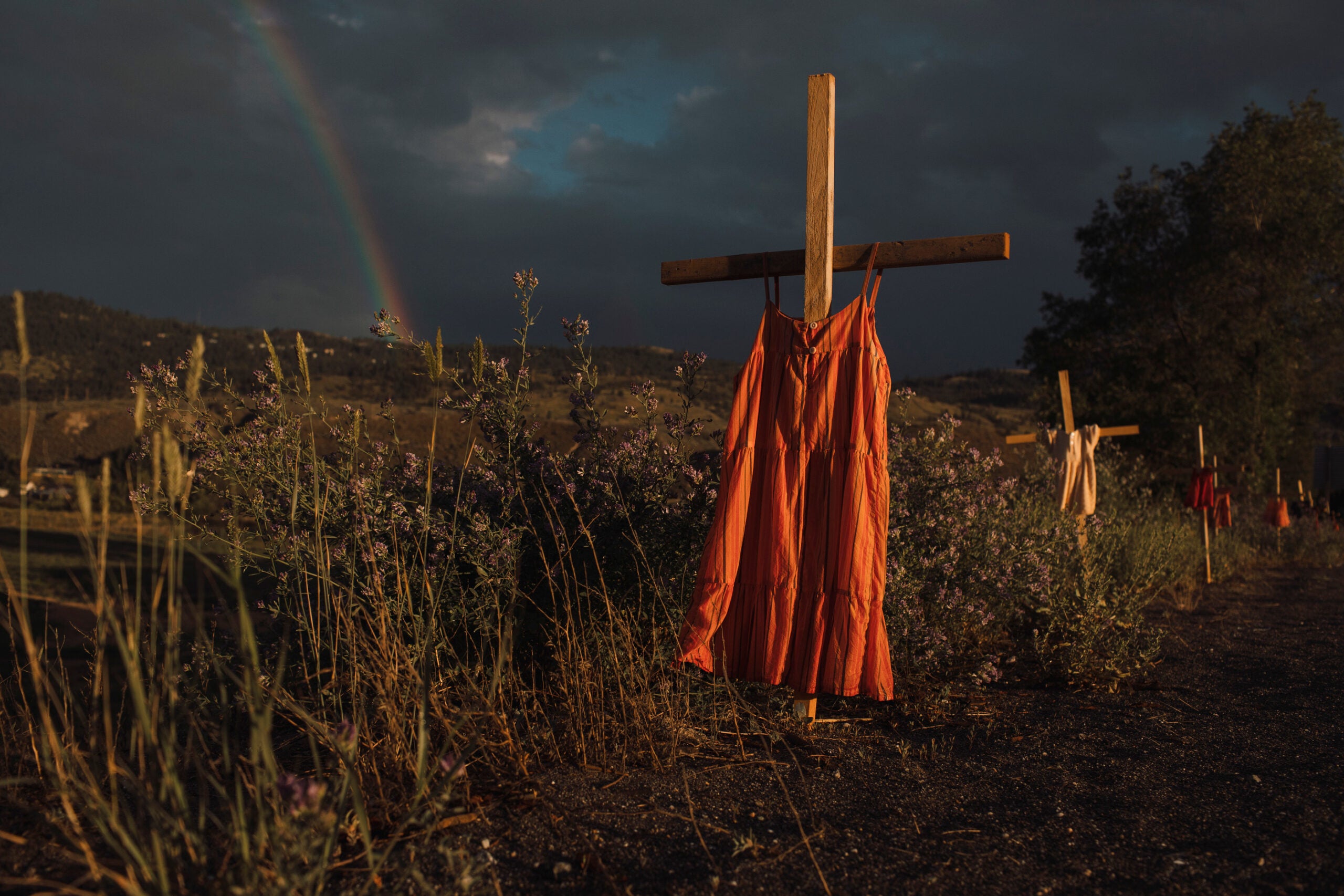 A red dress along the highway signifies the children who died at the Kamloops Indian Residential School in Kamloops, British Columbia on Saturday, June 19, 2021. Red dresses are also used to signify the disproportionate number of missing and murdered Indigenous women and girls.