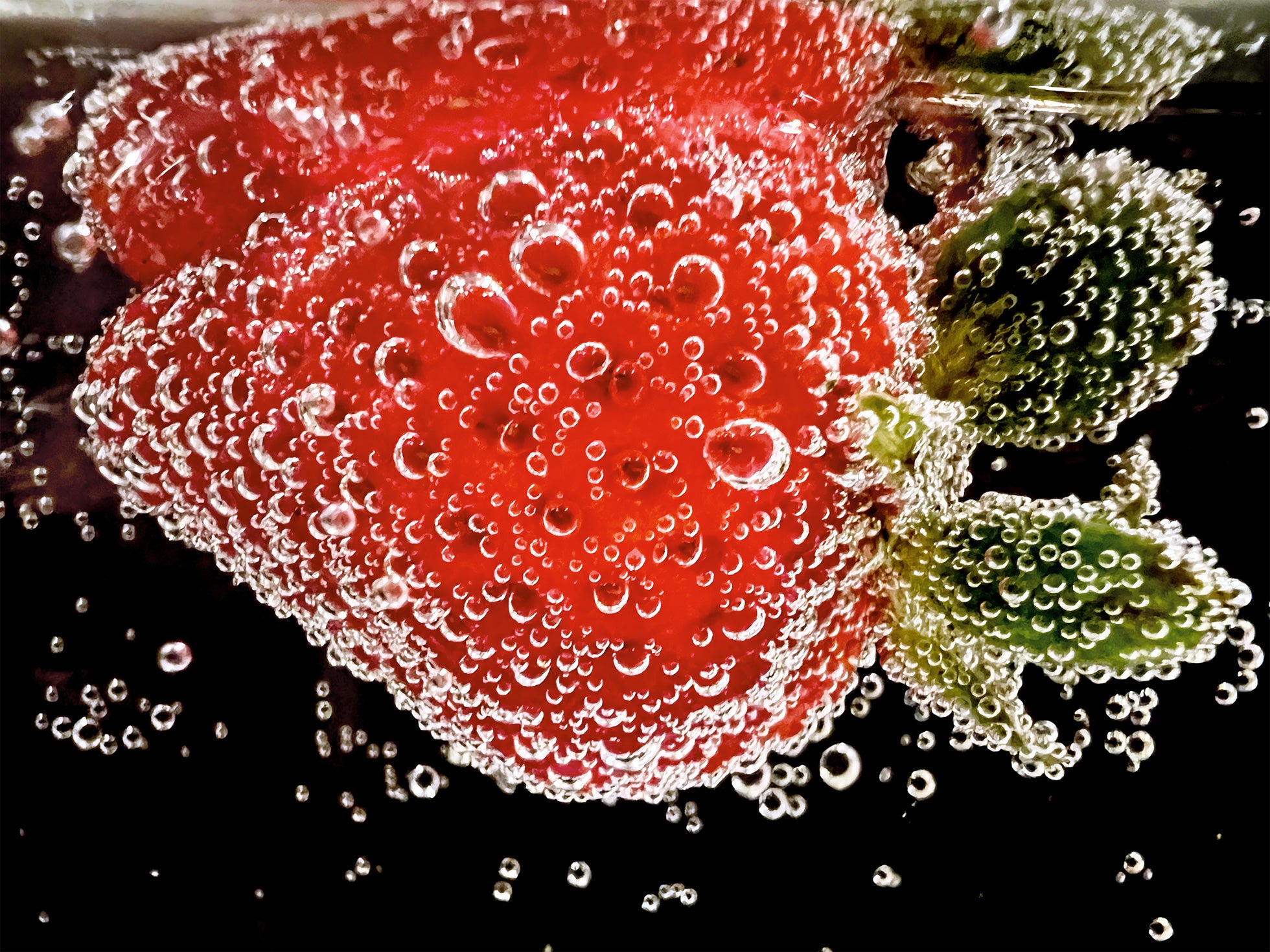 strawberry covered in soda bubbles for apple shot on iphone macro challenge