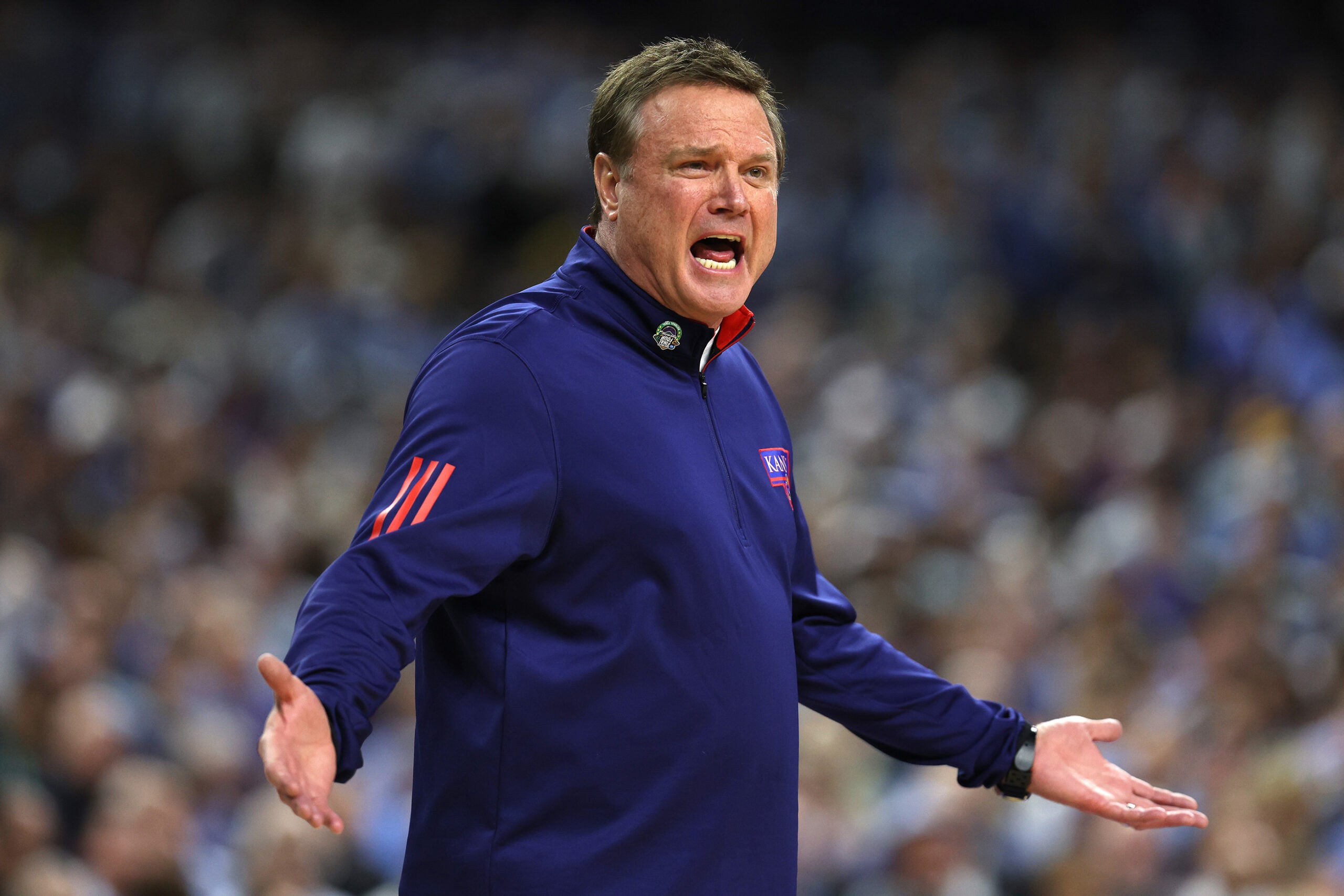 Head coach Bill Self of the Kansas Jayhawks reacts from the sidelines in the first half of the game against the North Carolina Tar Heels during the 2022 NCAA Men's Basketball Tournament National Championship.