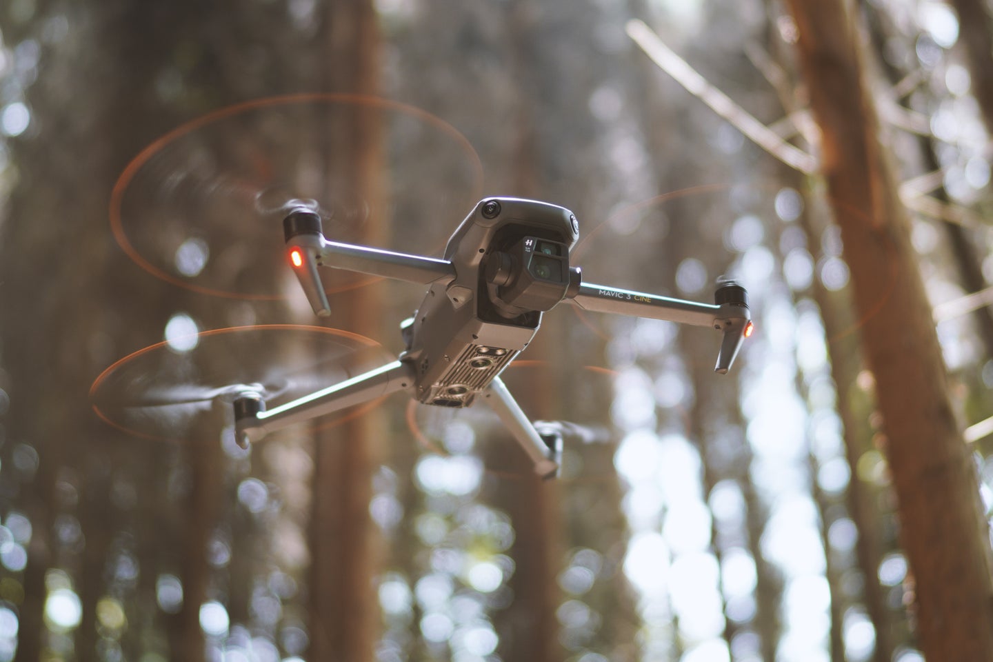 drone flying through the forest