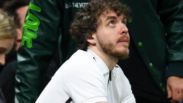 Rapper Jack Harlow messes with an NBA videographer’s gear during a live broadcast Rapper Jack Harlow messes with an NBA videographer’s gear during a live broadcast