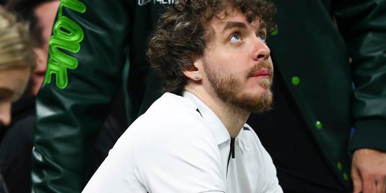 Rapper Jack Harlow messes with an NBA videographer’s gear during a live broadcast