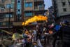 Protesters throwing firebombs in Yangon, in an attempt to block the military and police forces who fired bullets at the crowds.