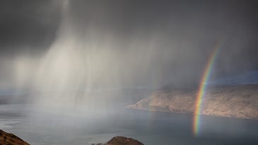 Scottish sublime. North Morar in the foreground with Knoydart behind the rainbow over Loch Nevis.