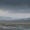 Barmouth Bridge at dusk, Mawddach Estuary, Gwynedd.