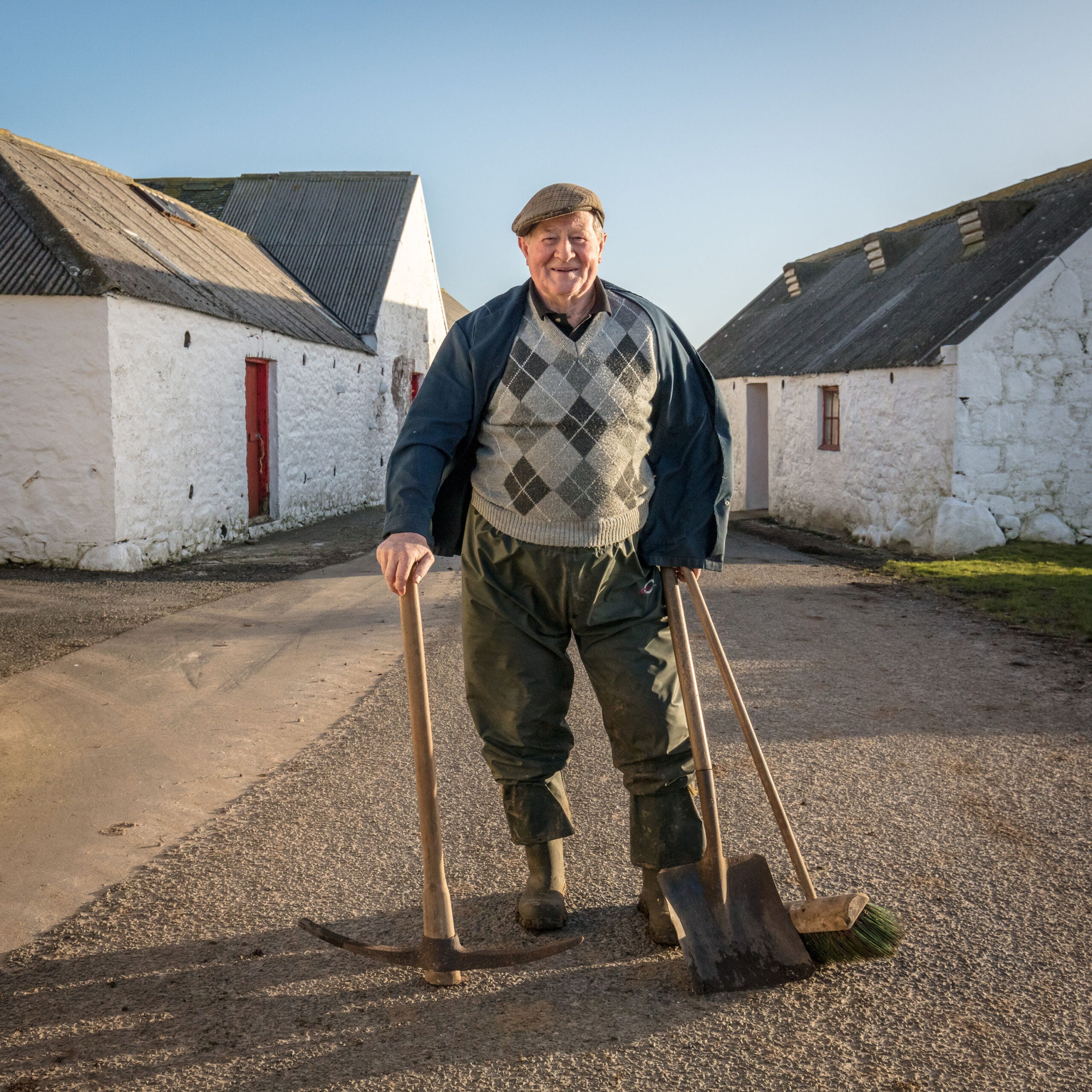 Hughes of Knockencule Farm on the way to feed his cows.