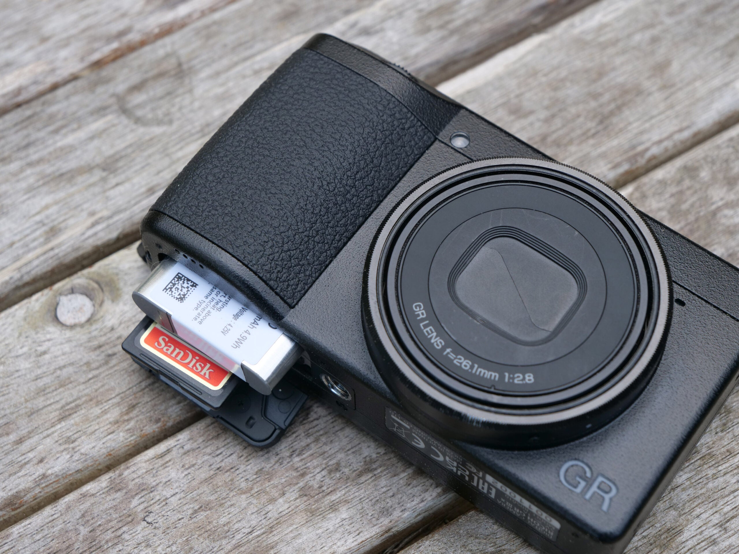 Ricoh GR IIIx battery and memory card.