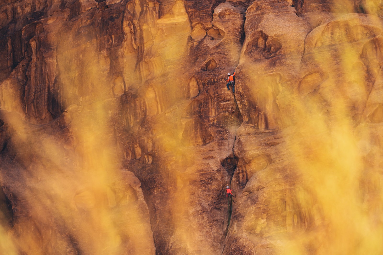 rock climbers at sunset