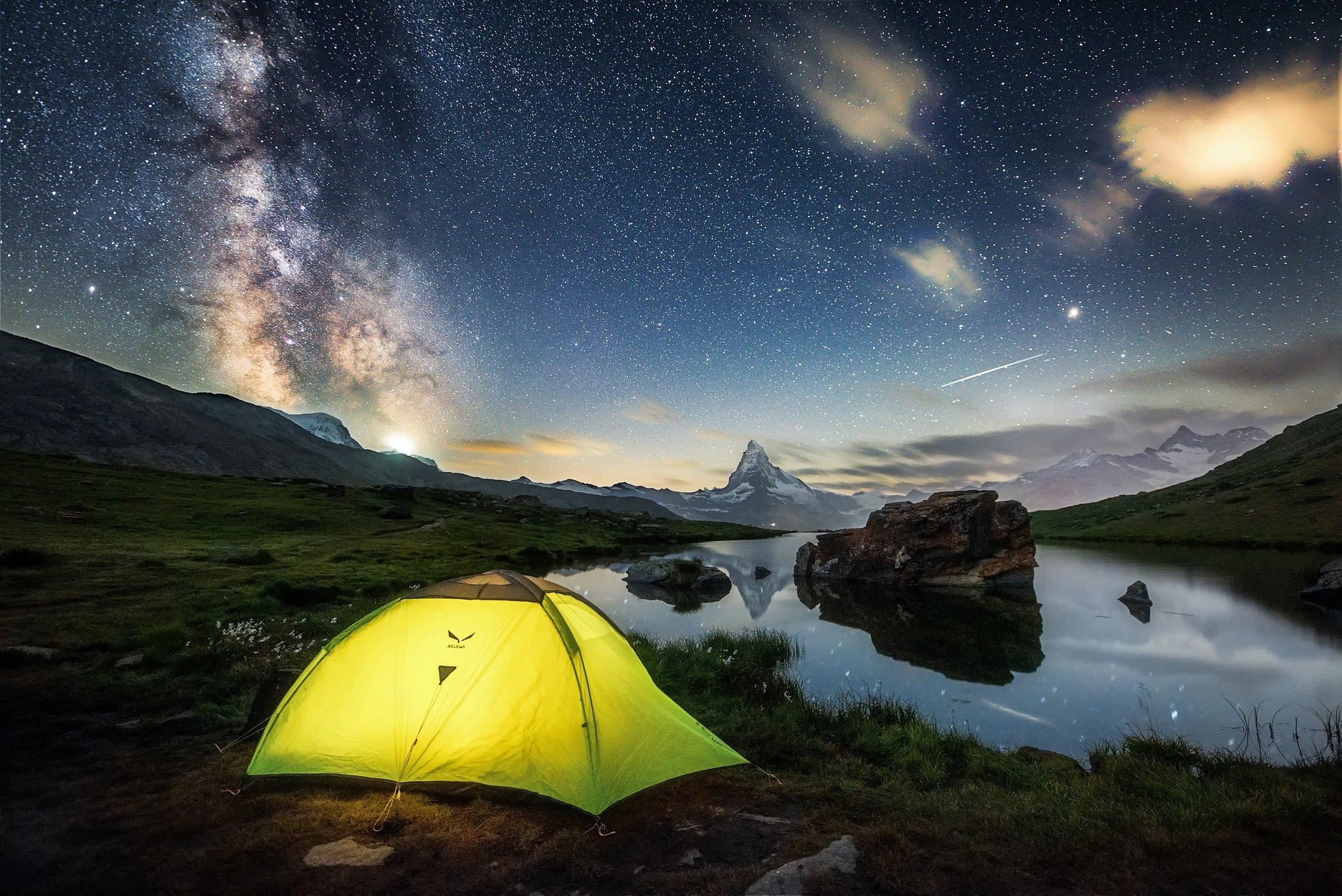 green tent under the milky way