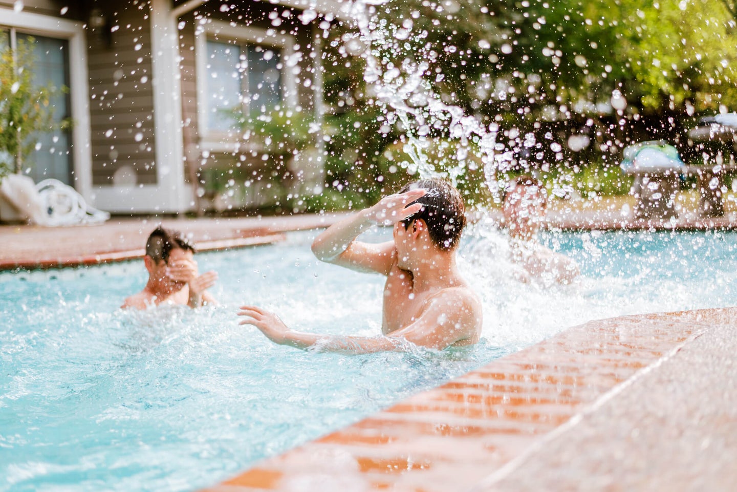 kids playing in pool 4th of july