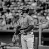 baseball player dusts chalk