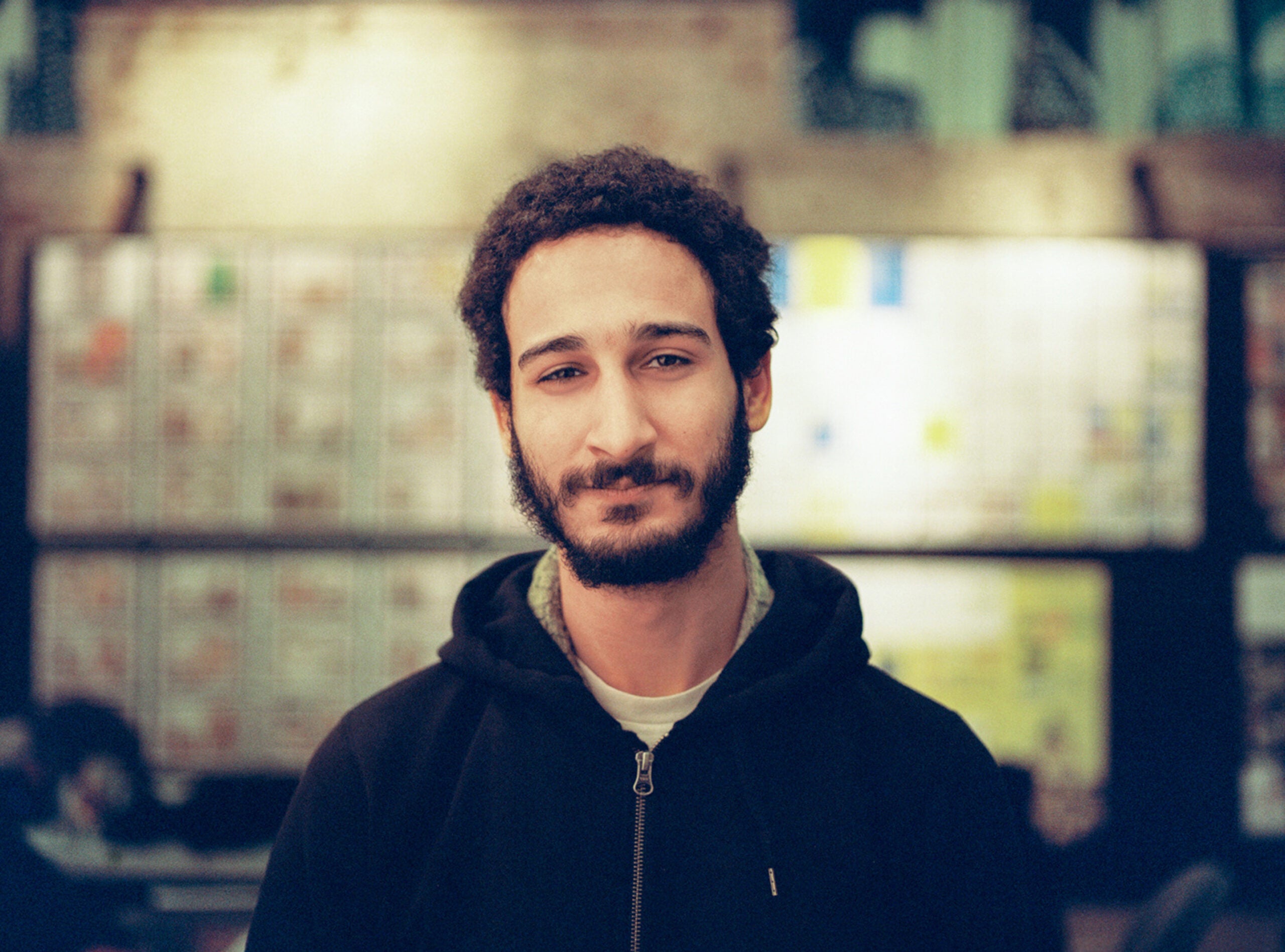 Portrait of a man with a blurry background.