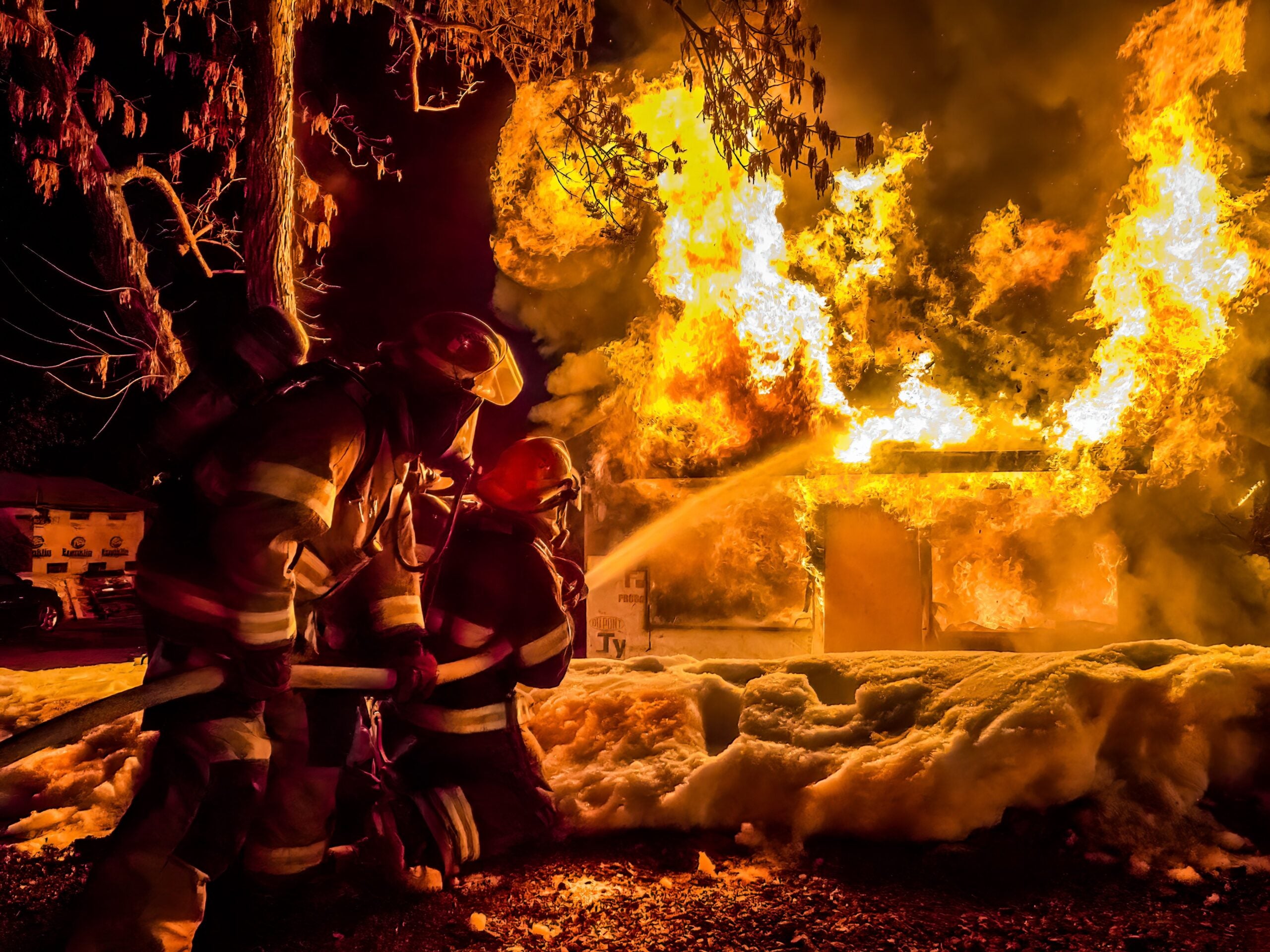 firefighters fighting house fire