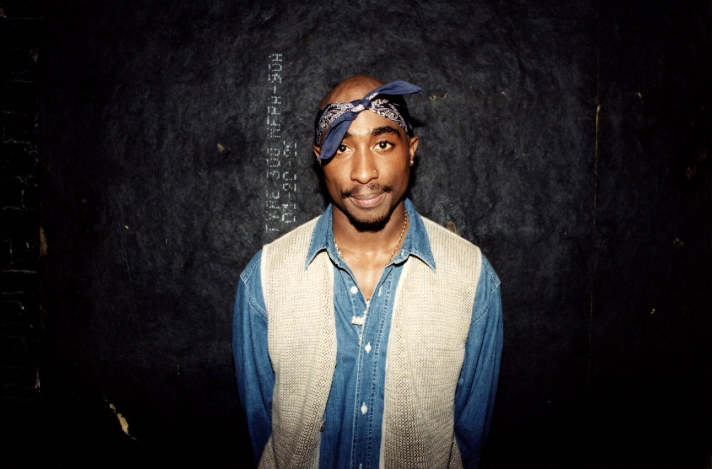 Rapper Tupac Shakur poses for photos backstage after his performance at the Regal Theater in Chicago, Illinois in March 1994.