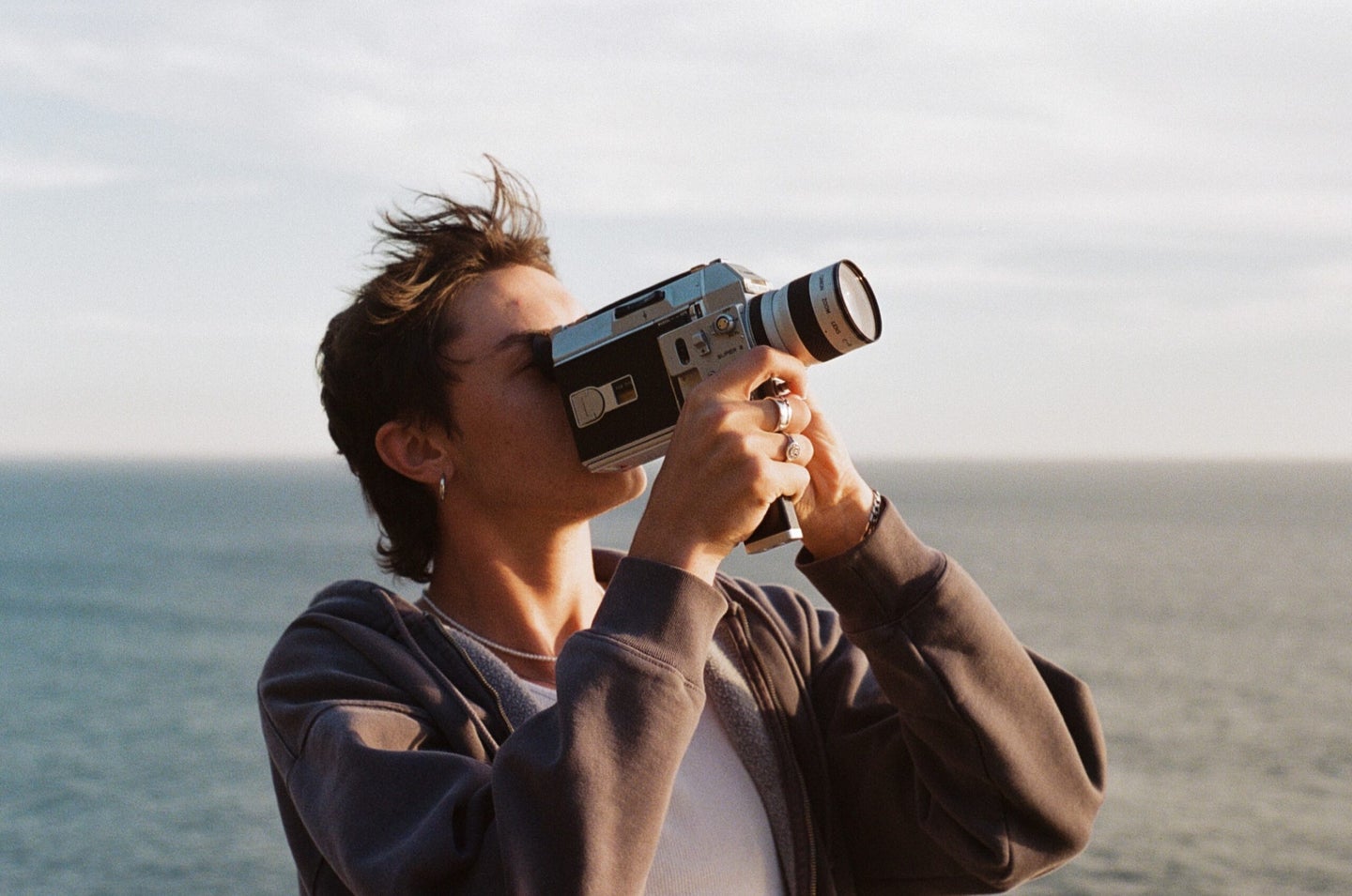 person holds super 8 camera