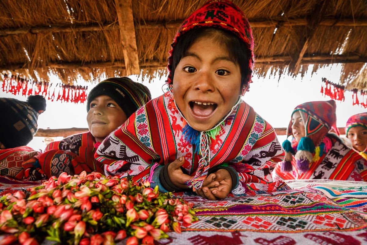 Quechua boy wearing traditional clothes in peru