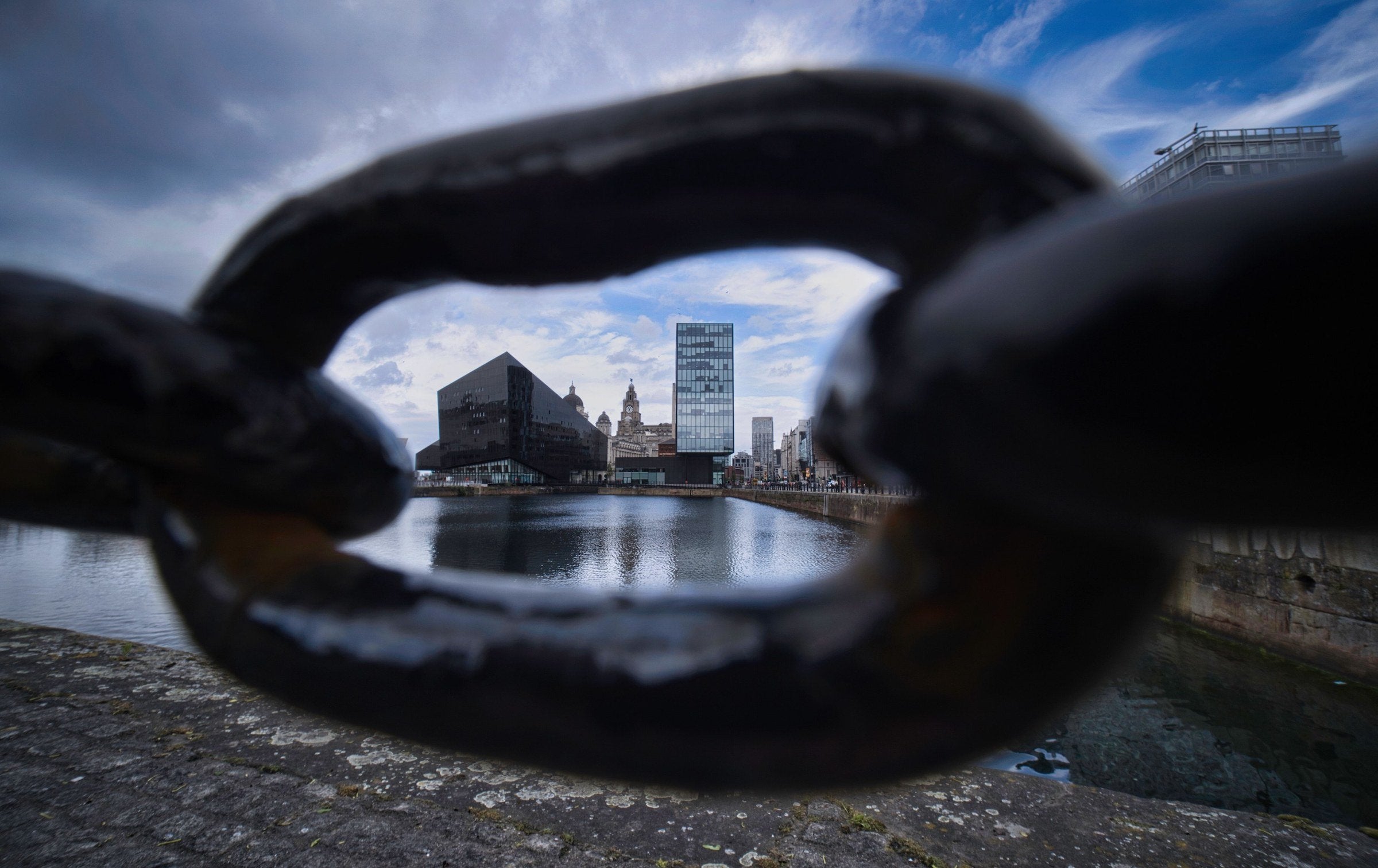 Chainlink cityscape photo shot with Laowa CF 10mm f/4 "cookie" lens