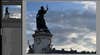 A photo of a statue against a blue sky