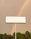 empty billboard and rainbow