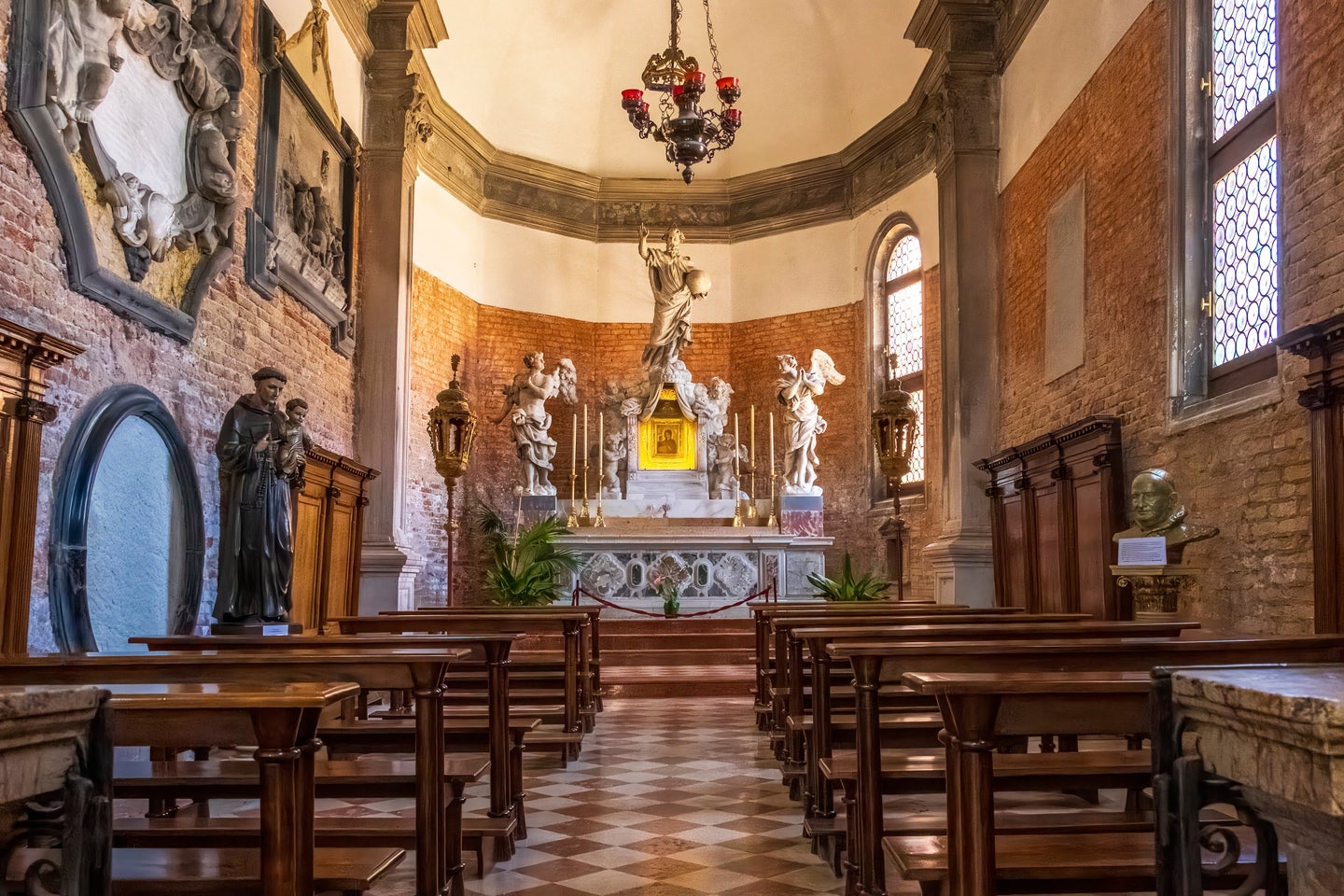 A interior photo of a church with lots of visible noise from using a high ISO.