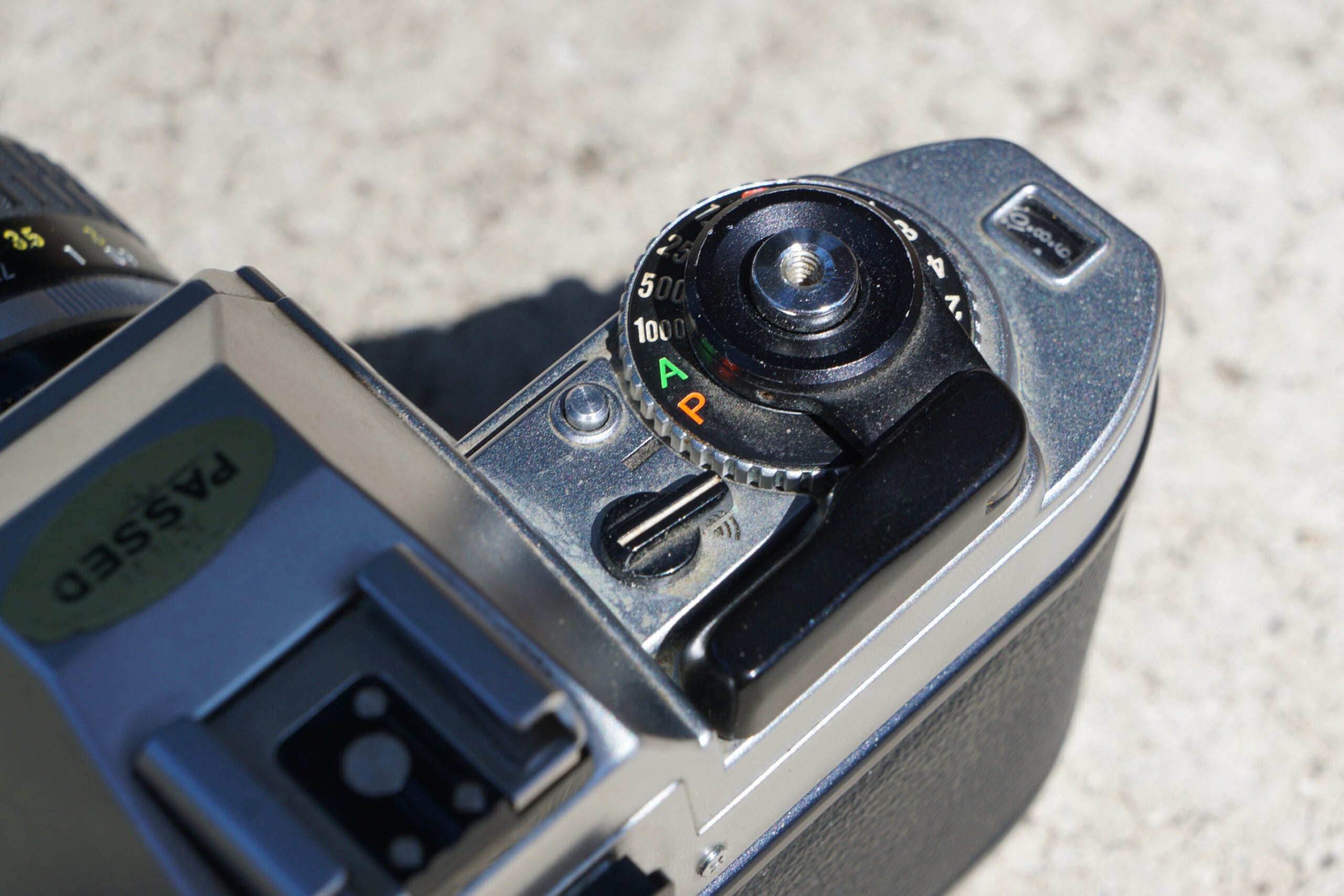 The Nikon FG film camera shutter button
