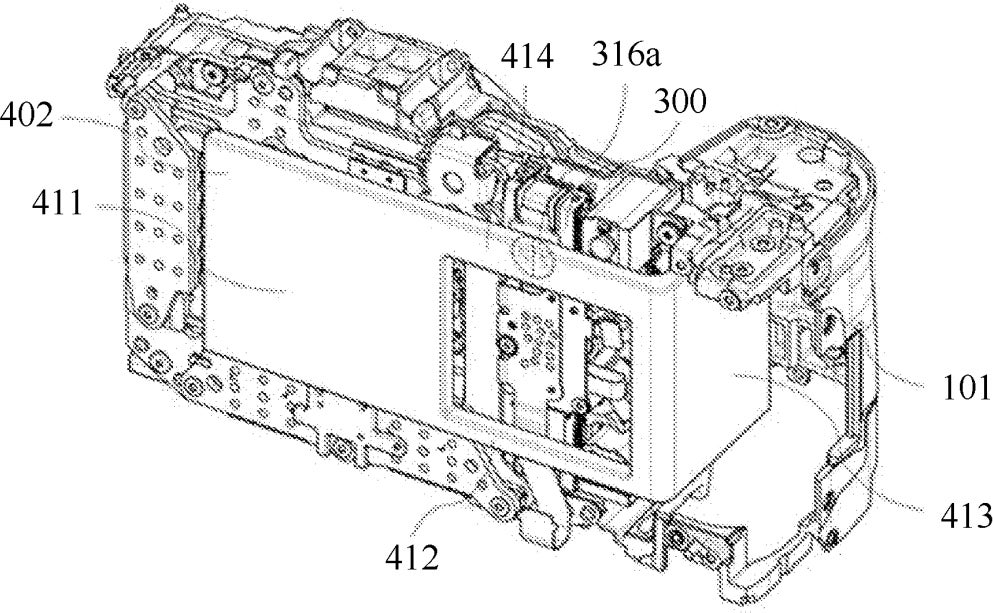 Canon’s passive cooling system. The L-shaped block with square cutout wrapping from behind the camera into the handgrip is the magnetic cooling system.