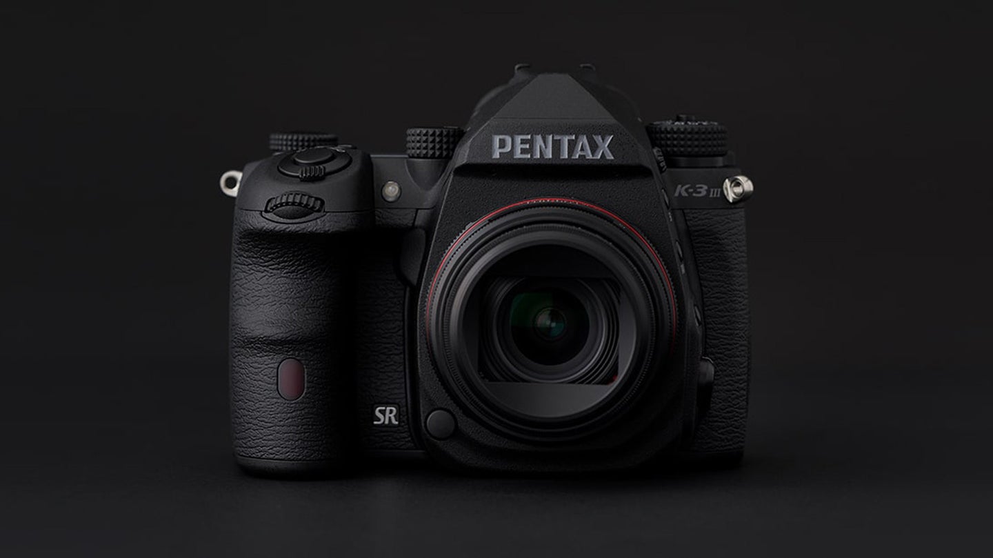 Pentax K-3 III DSLR on a dark background
