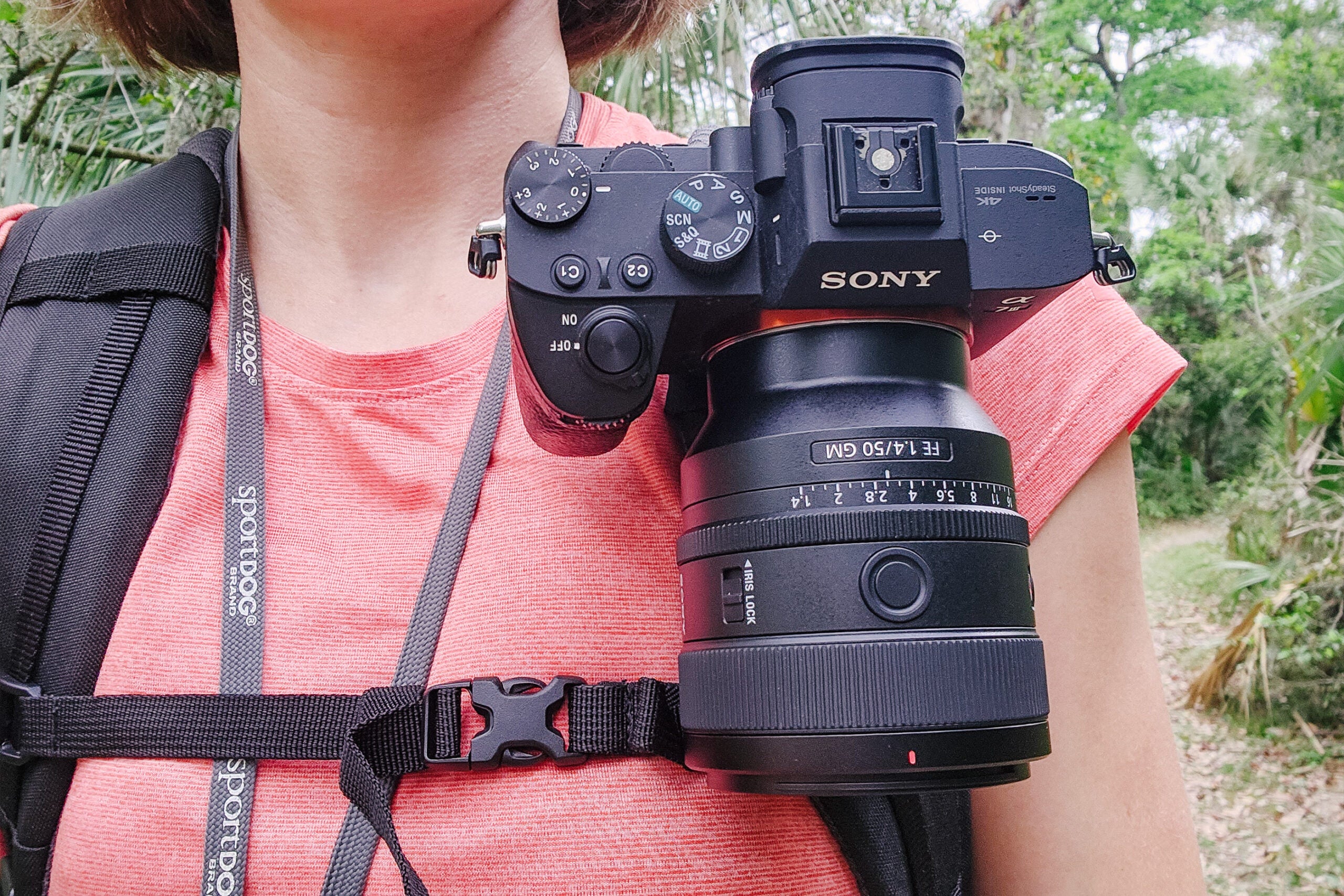 Sony FE 50mm f/1.4 GM with the Sony A7 III on a backpack strap.