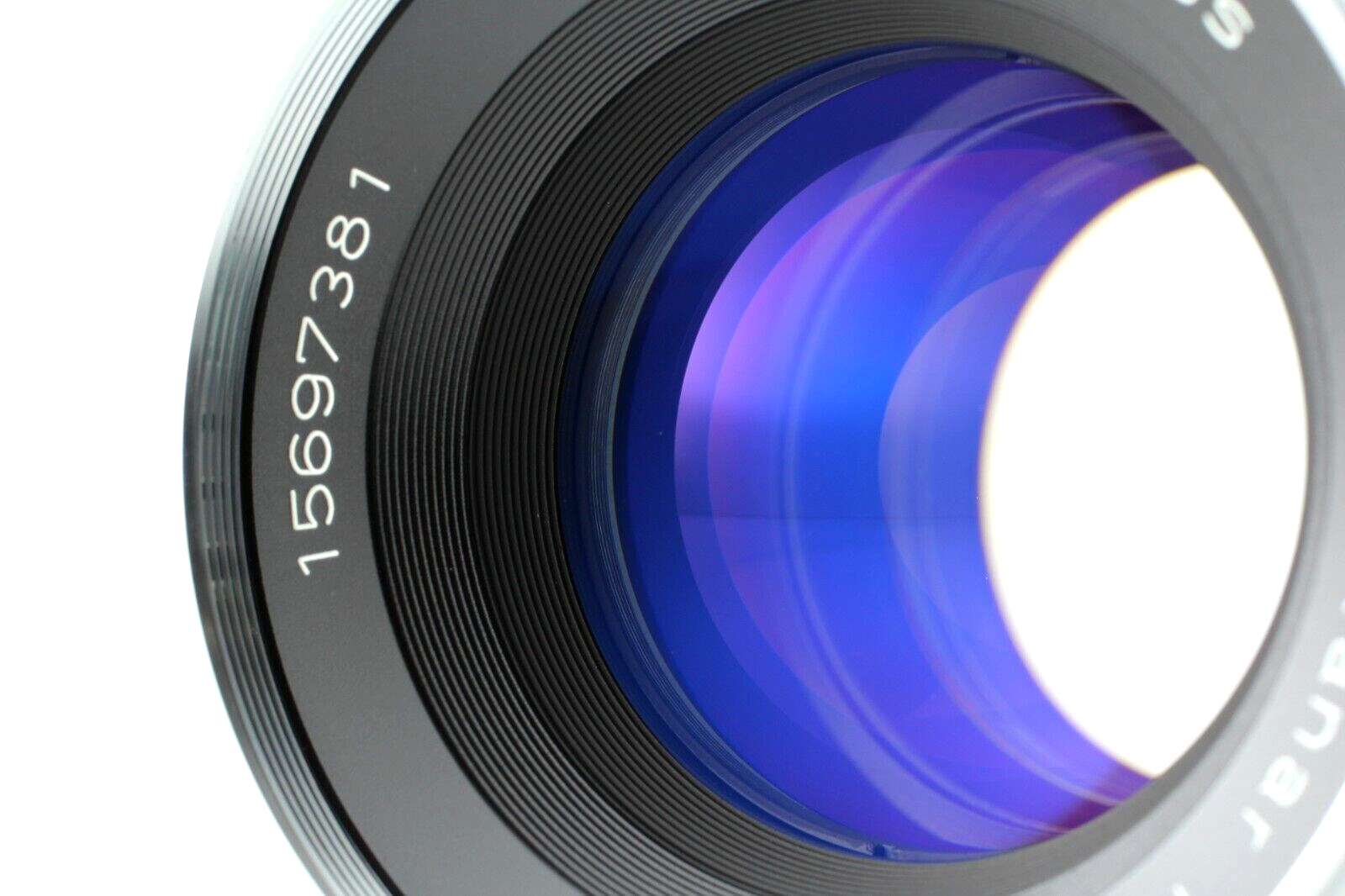 An up-close shot of the Zeiss ZF-IR 50mm planar lens to show the coating.