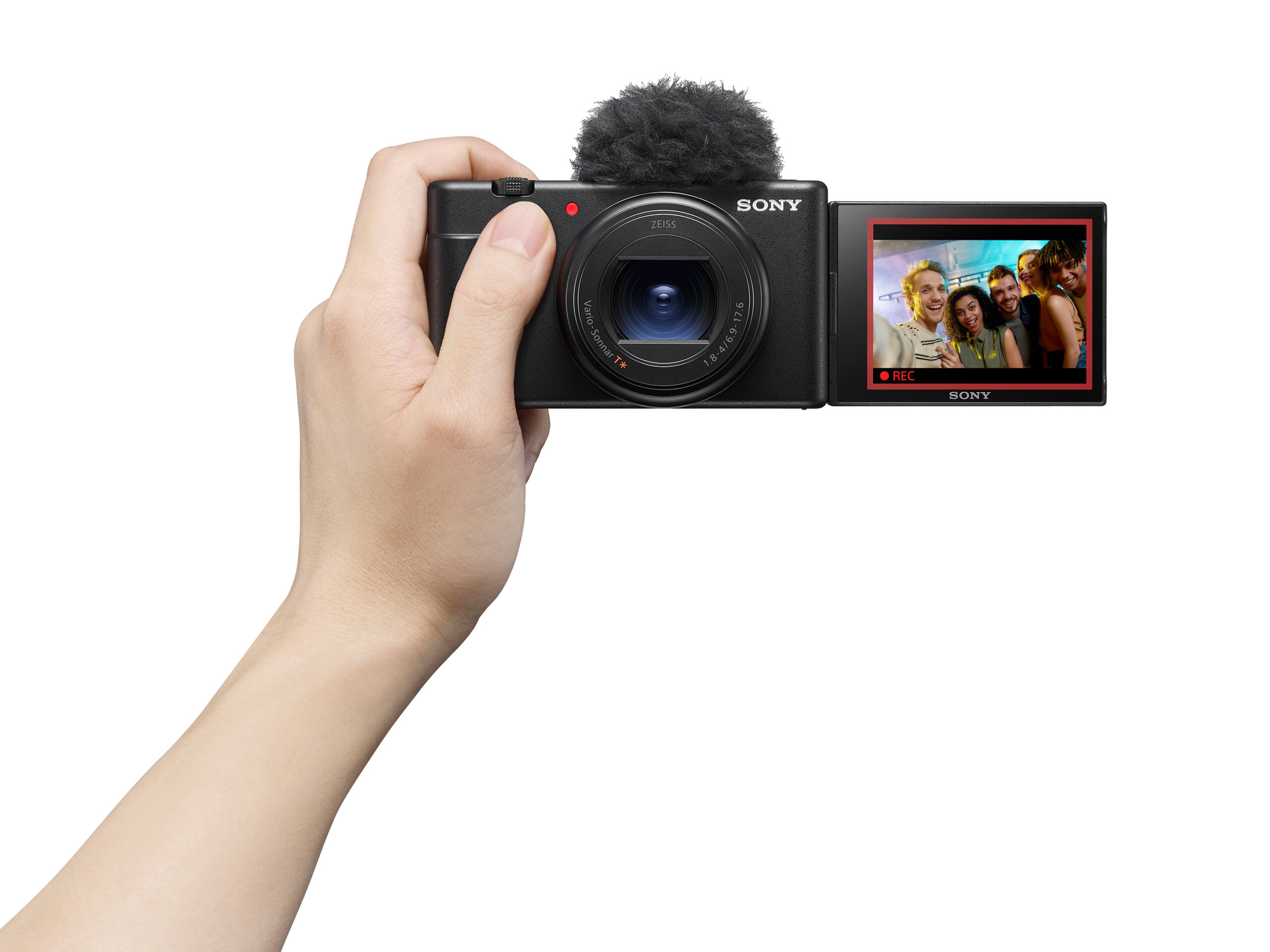 A hand holding the Sony ZV-1 II vlogging camera