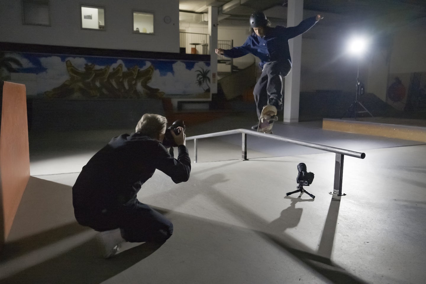 A photographer takes a photo of a skateboarder using a remote camera with the Z9 firmware update