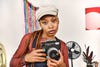 Fujifilm SQ40 instant film camera in a photographer's hands
